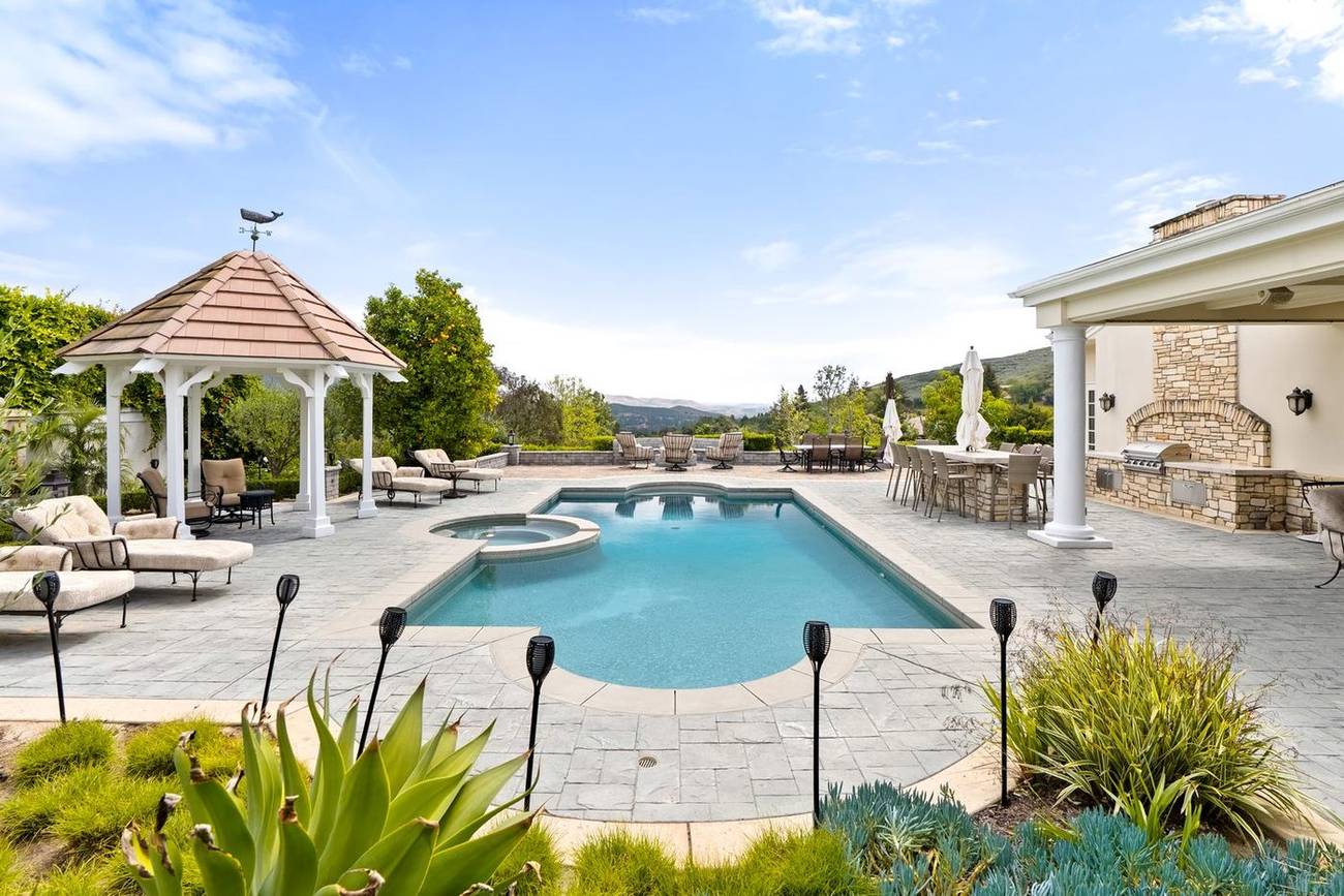 Backyard pool and gazebo living in North Ranch
