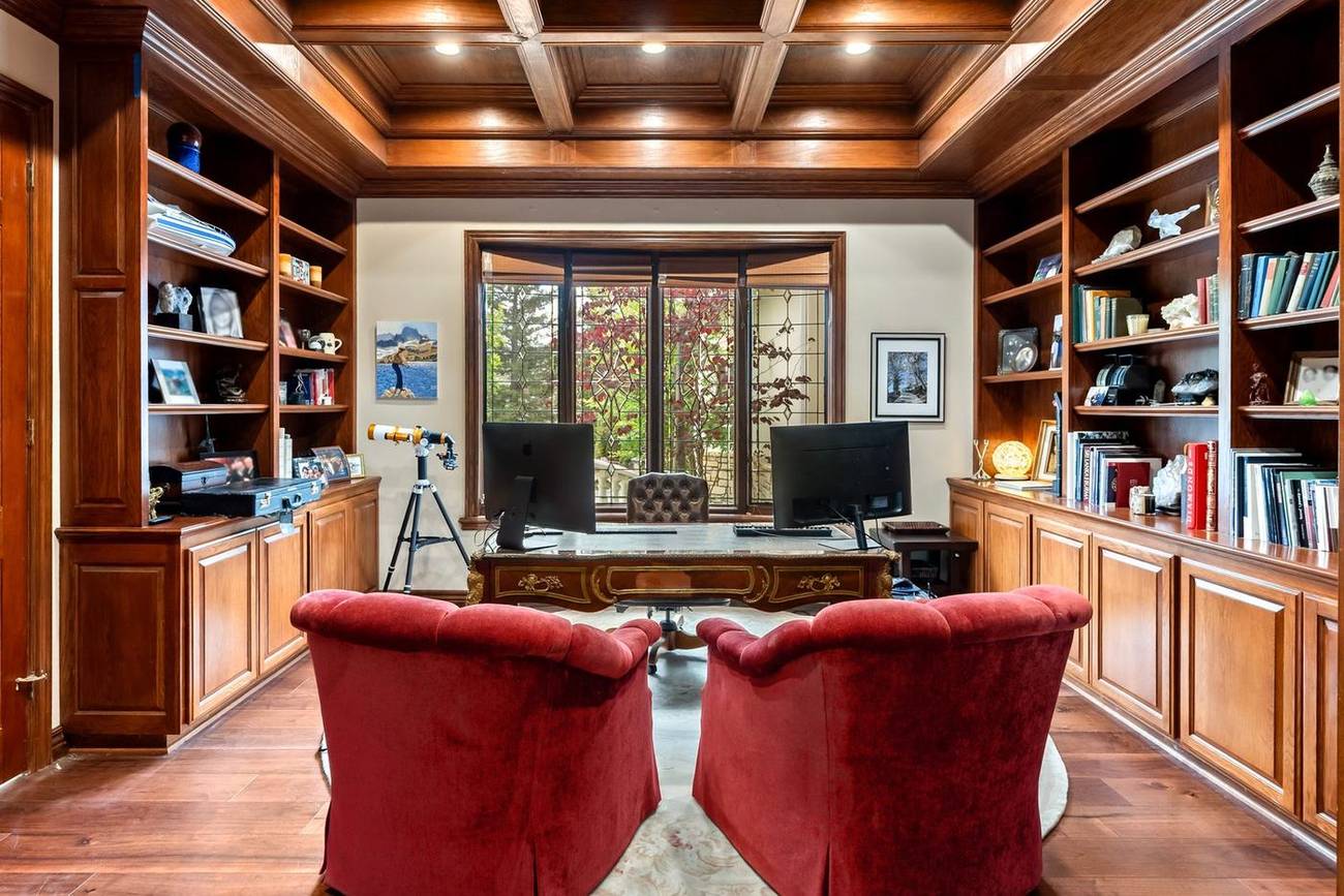 1403 Kingsboro Court — wood-paneled library