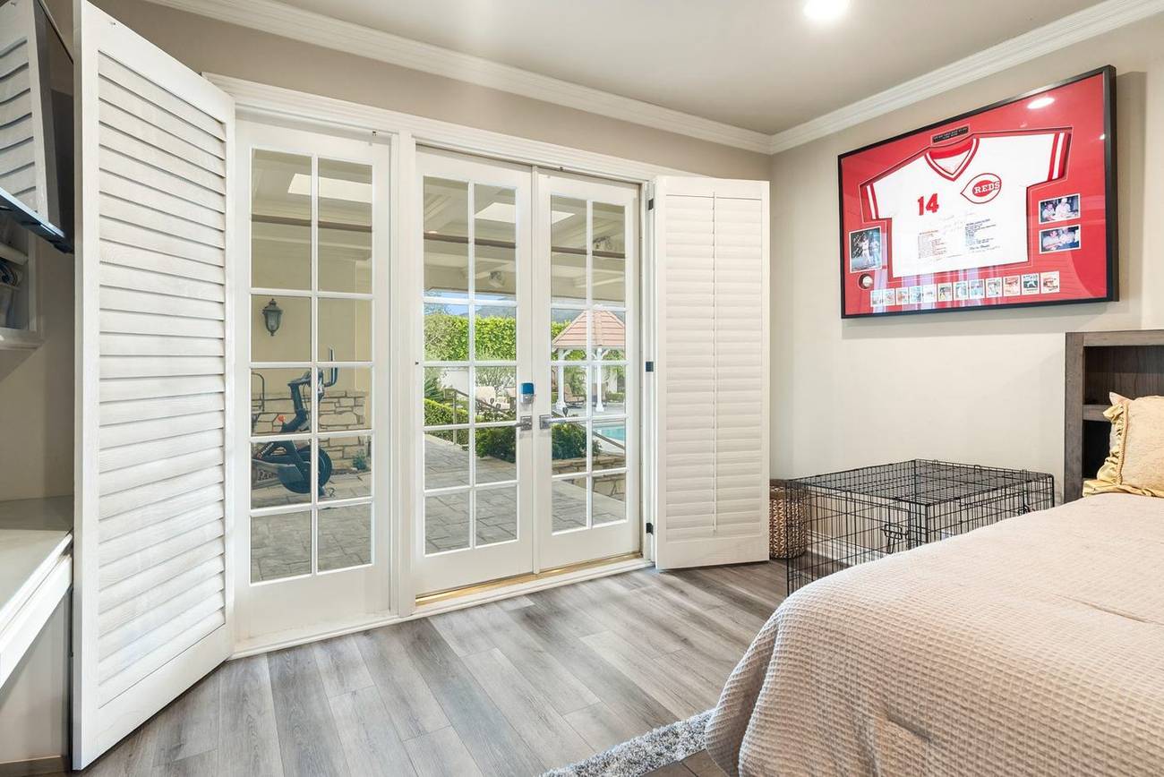 1403 Kingsboro Court — guest suite opening to the pool