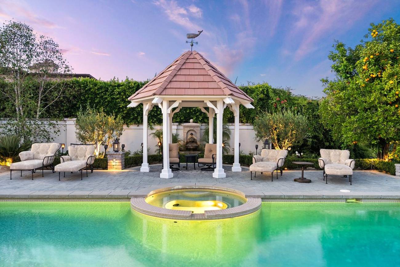 1403 Kingsboro Court — spa and gazebo at dusk