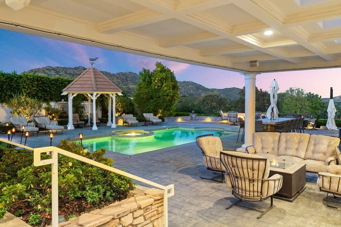 1403 Kingsboro Court — covered loggia at twilight