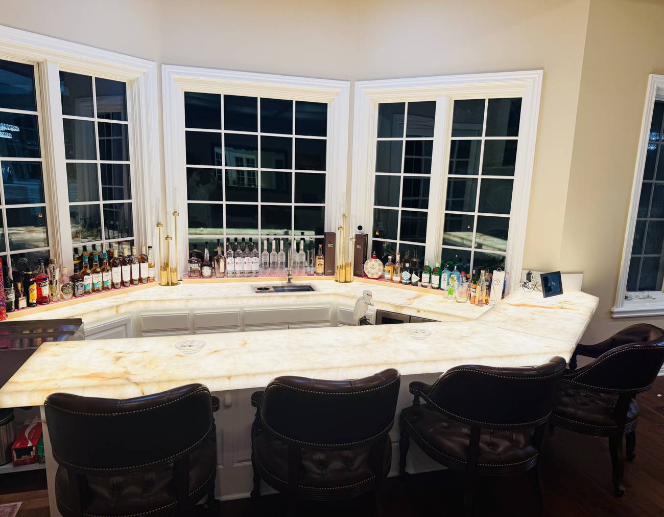 1403 Kingsboro Court, backlit bar with bay windows over the valley